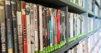 A collection of DVDs on a shelf
