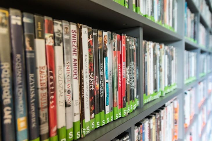 A collection of DVDs on a shelf