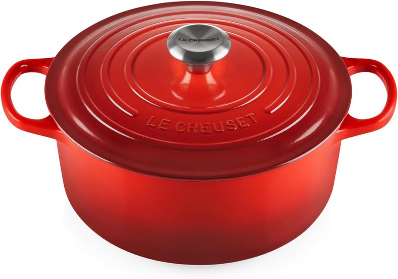 Le Creuset enameled cast iron 5.5 quart round Dutch oven in Cerise red