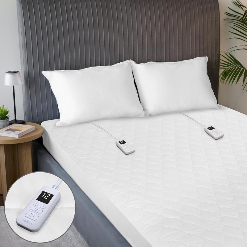 Sunbeam Restful Quilted heated mattress pad on a queen bed