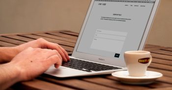 Designer building a website on a laptop